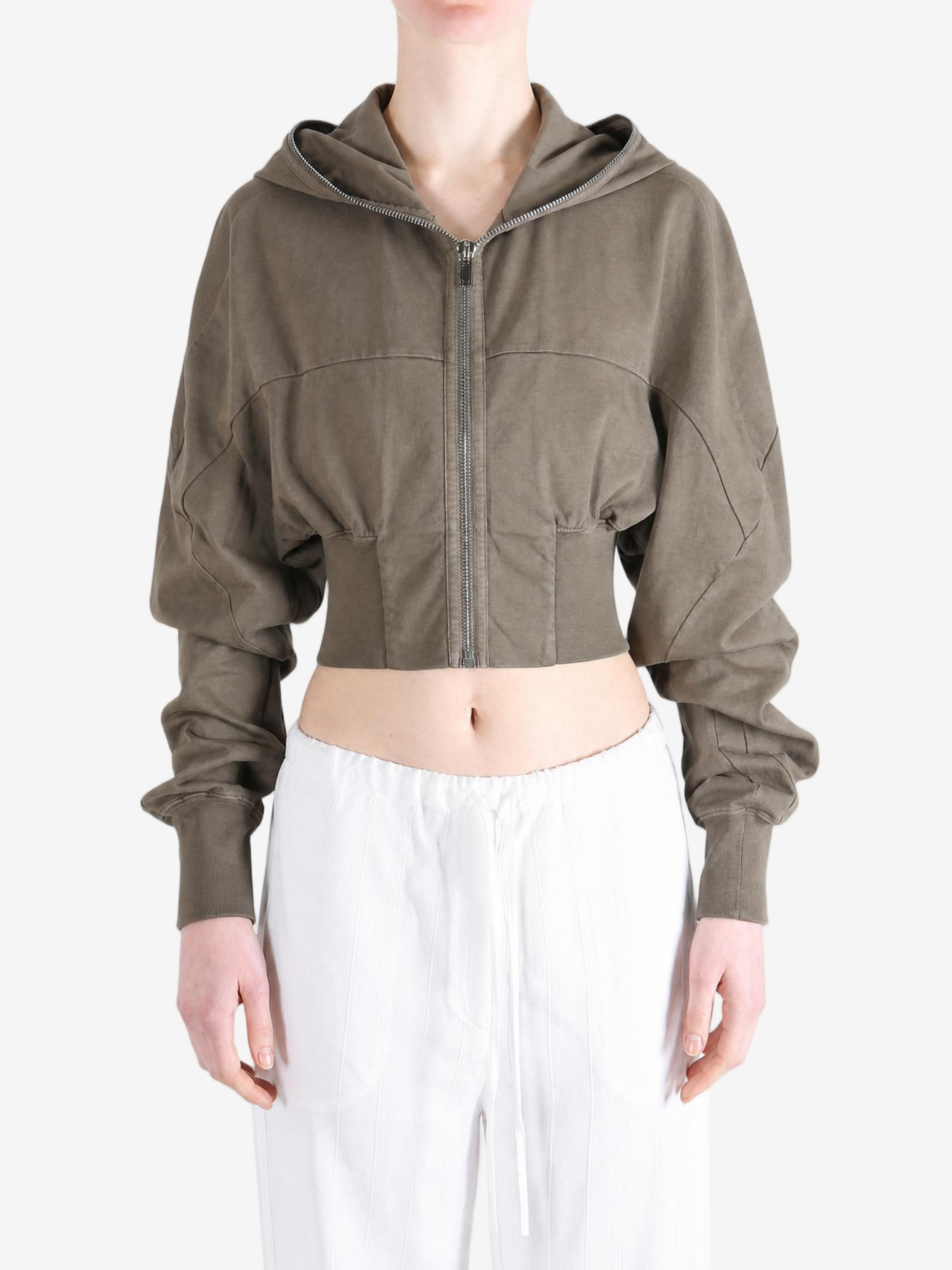Brown hoodie worn by a person, showing the hoodie fit