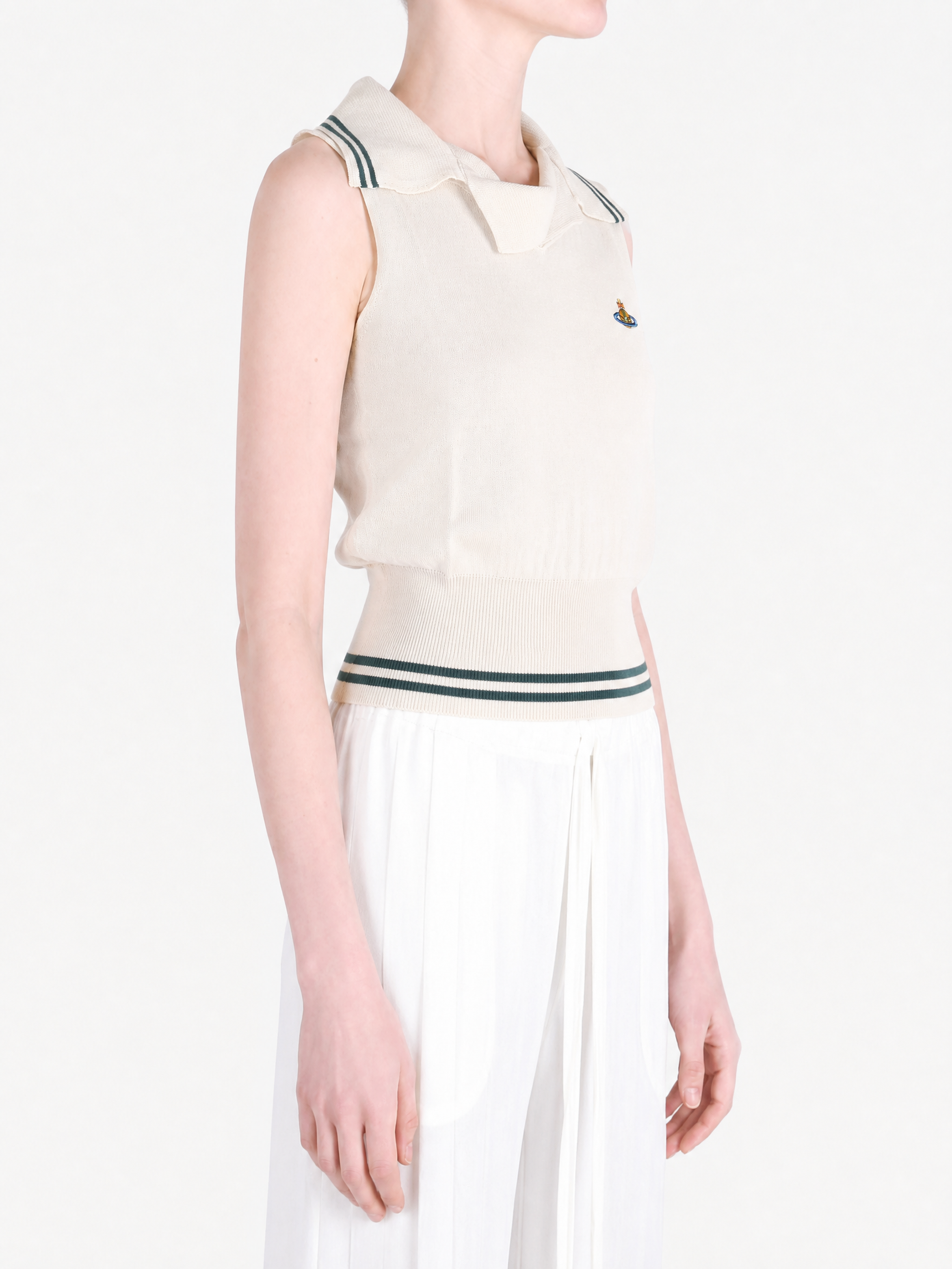 Tan top worn by a person, showing the top fit