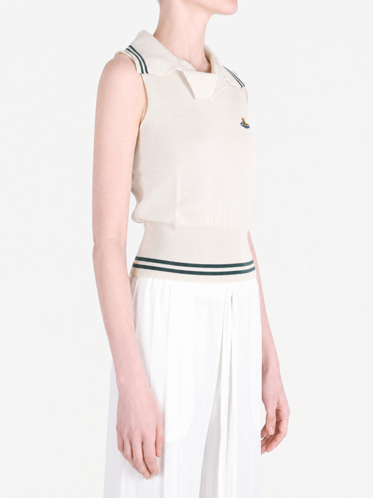 Tan top worn by a person, showing the top fit