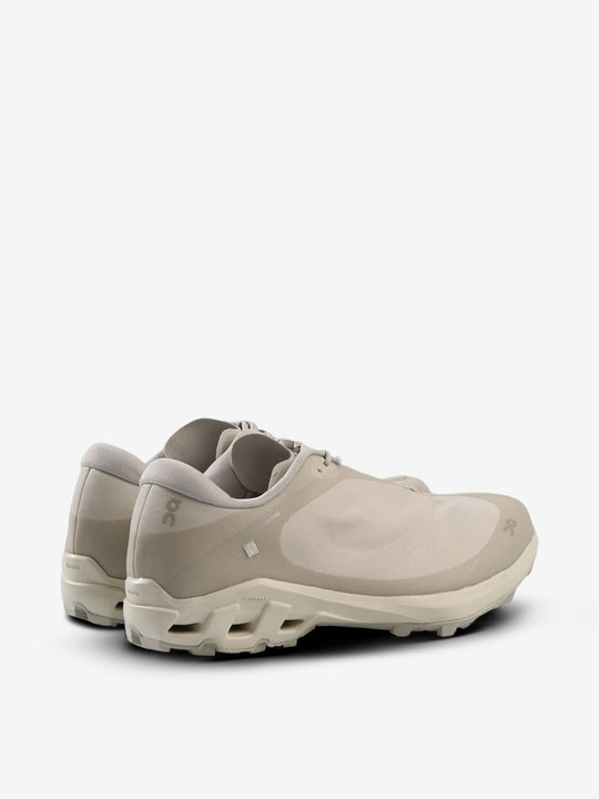 Tan sneakers,back view