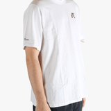 White t-shirt worn by a person, showing the t-shirt's fit