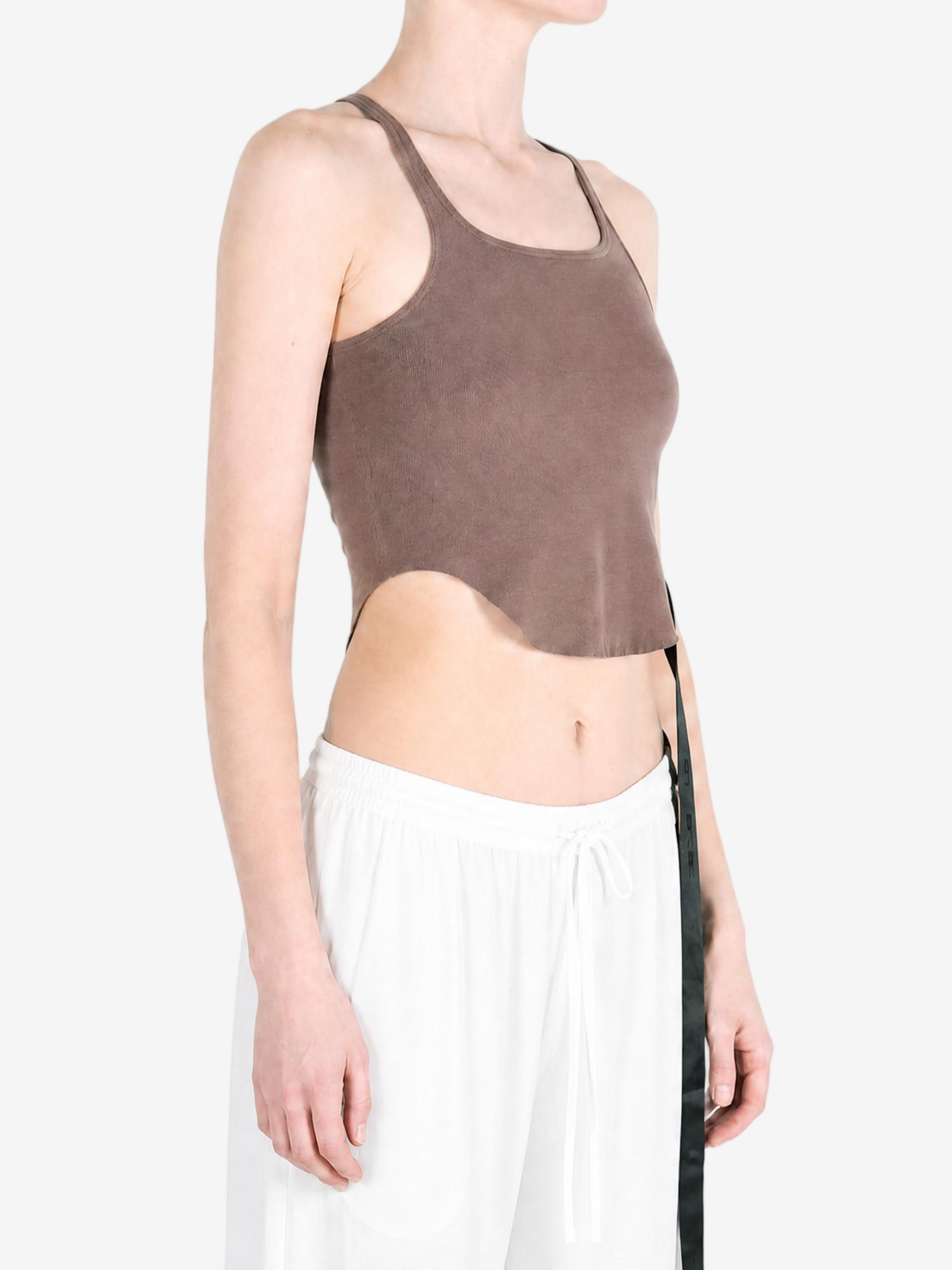 Brown top worn by a person, showing the top fit