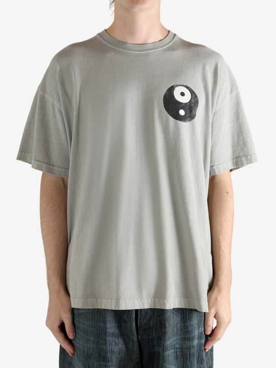 Gray t-shirt worn by a person, showing the shirt's fit