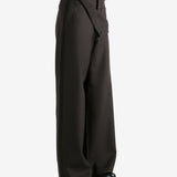 Brown pants worn by a person, showing the pants fit