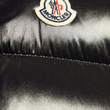 Close up of Black jacket, showing texture of the 100% polyamide fabric