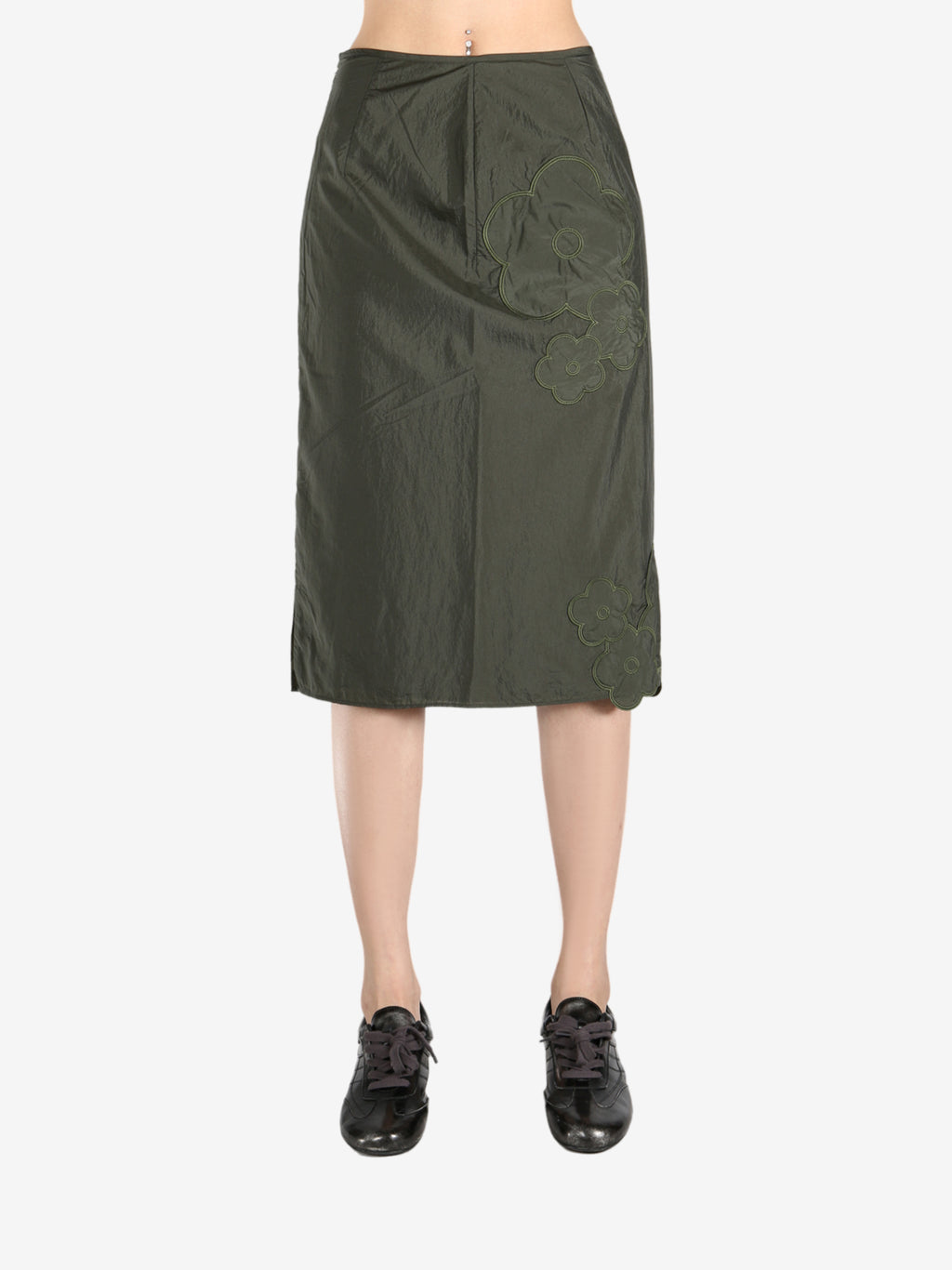 Green skirts worn by a person, showing the skirts fit
