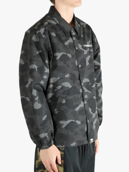 Black jacket worn by a person, showing the jacket's fit