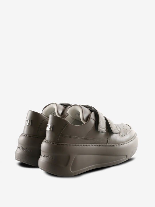 Grey sneakers, back view