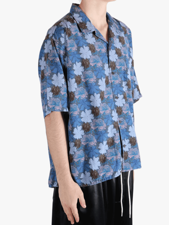 Navy shirt worn by a person, showing the shirt's fit