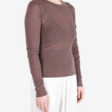 Brown t-shirt worn by a person, showing the t-shirt fit