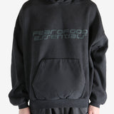 Black hoodie worn by a person, showing the hoodie's fit