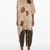 Brown top worn by a person, showing the top's fit