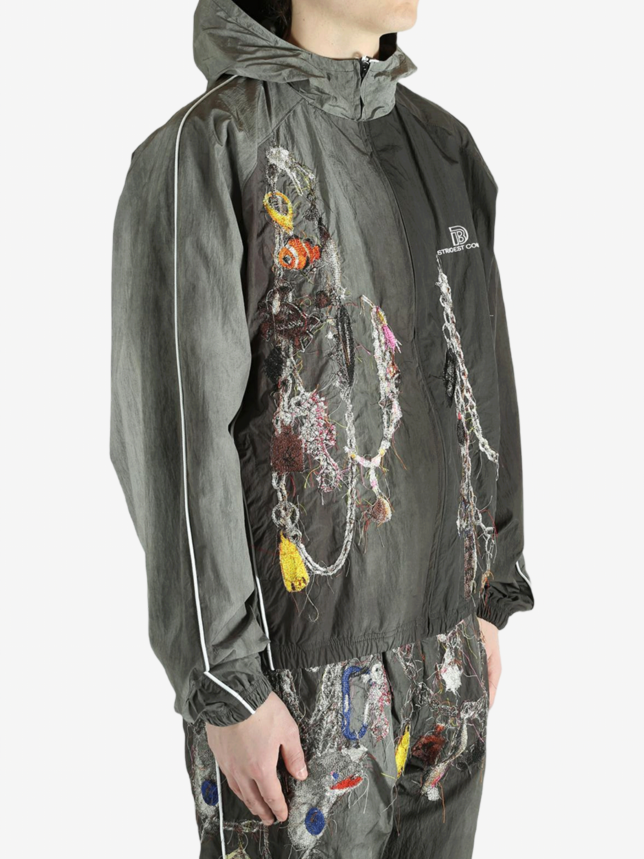 Grey jacket worn by a person, showing the jacket's fit