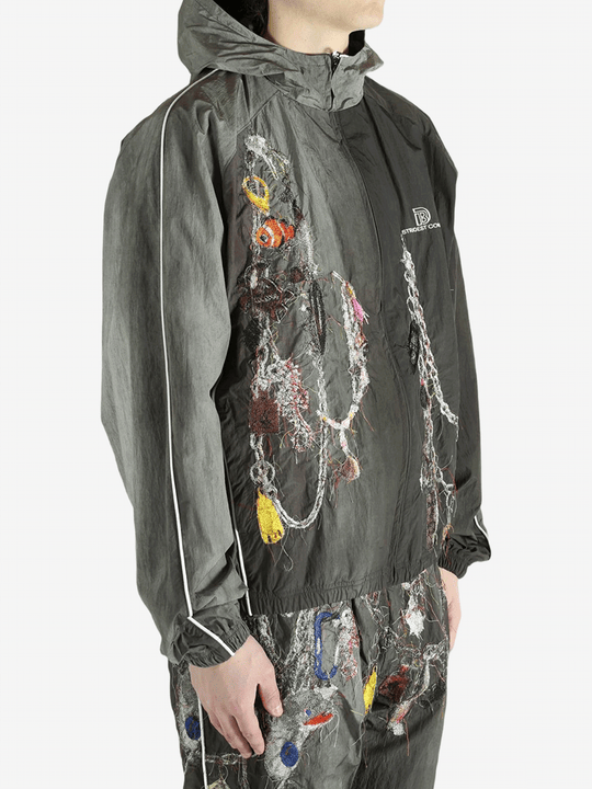 Grey jacket worn by a person, showing the jacket's fit