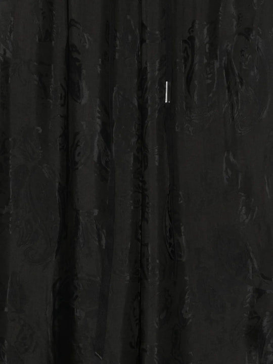 Close up of Black pants, showing texture of the 62% acetate/ 38% viscose fabric