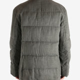 Grey jacket worn by a person, showing the jacket's fit