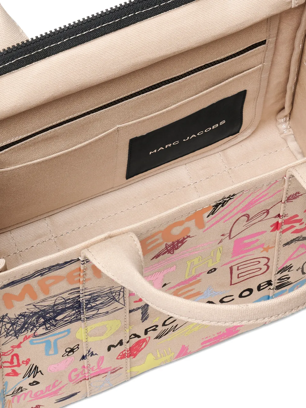 Close up of tan bag, showing texture of the fabric