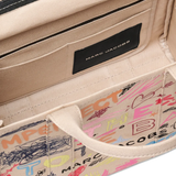 Close up of tan bag, showing texture of the fabric