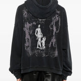 Black hoodie worn by a person, showing the hoodie's fit