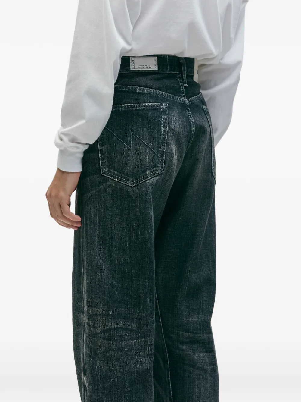 Blue pants worn by a person, showing the pants fit