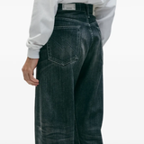Blue pants worn by a person, showing the pants fit