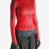 red jacket worn by a person, showing the jacket fit