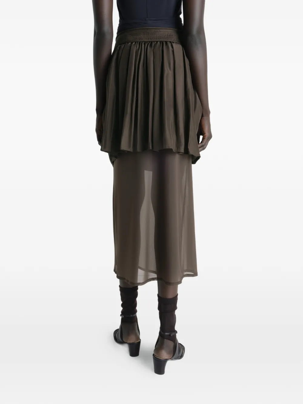 Brown skirt worn by a person, showing the skirt fit