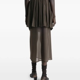 Brown skirt worn by a person, showing the skirt fit