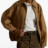 Brown jacket worn by a person, showing the jacket's fit