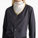 Tan scarves worn by a person, showing the scarves fit