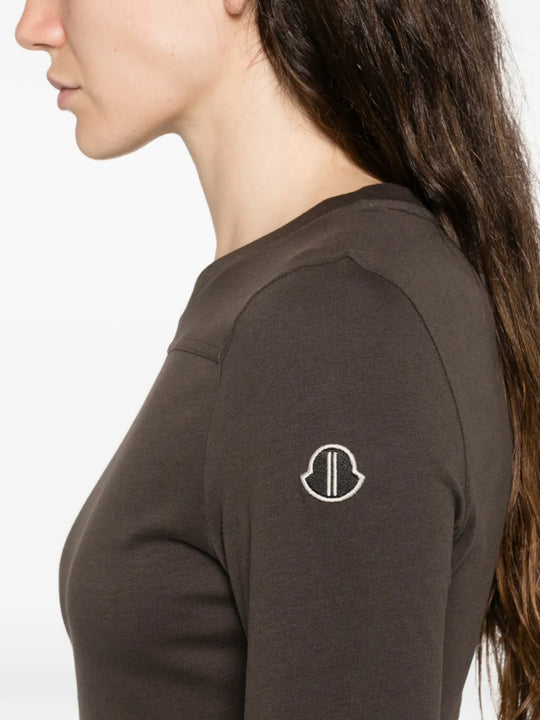 Close up of brown skirts, showing texture of the cotton fabric