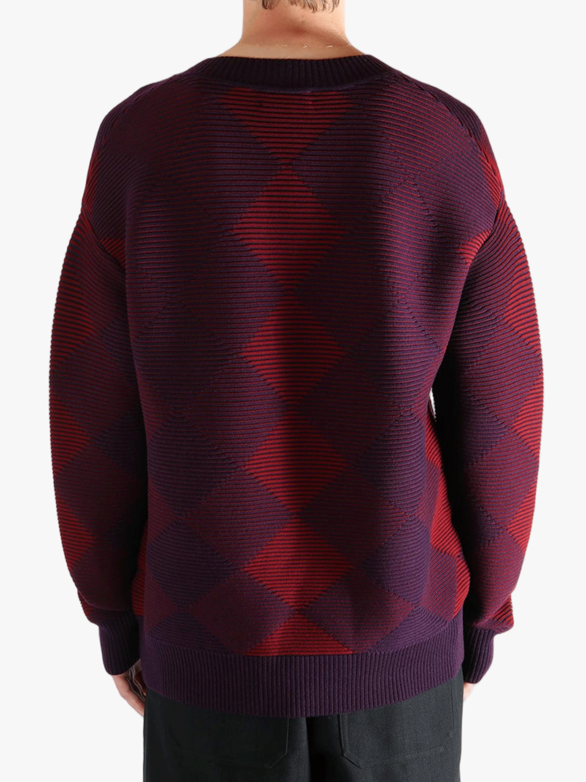 Red sweater worn by a person, showing the sweater fit
