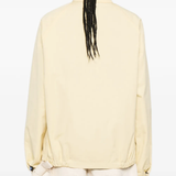 Tan skirt worn by a person, showing the skirt'fit