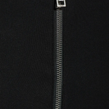 Close-up of black pants, showing texture of the viscose fabric
