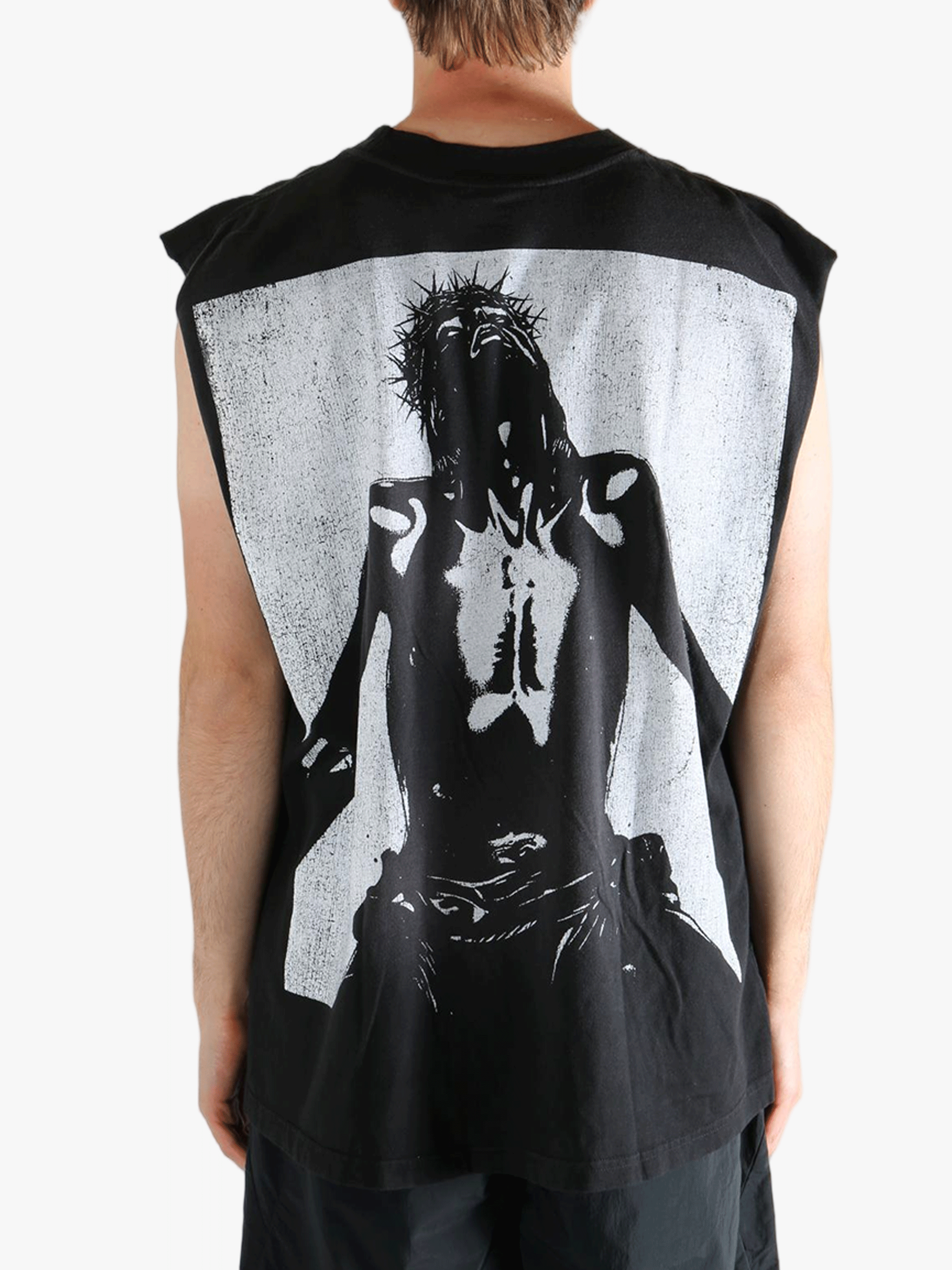 Black t-shirt worn by a person, showing the t-shirt's fit