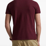 Burgundy top worn by a person, showing the top fit