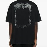 Black t-shirt worn by a person, showing the shirt's fit