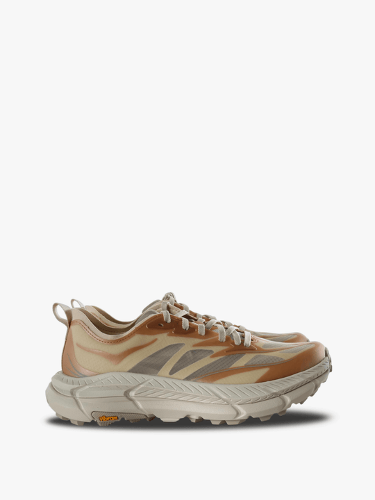 Tan shoes, side view