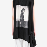 Black dress worn by a person, showing the dress fit