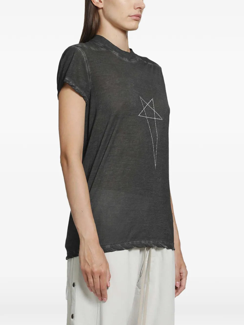 Black t-shirt worn by a person, showing the t-shirt fit