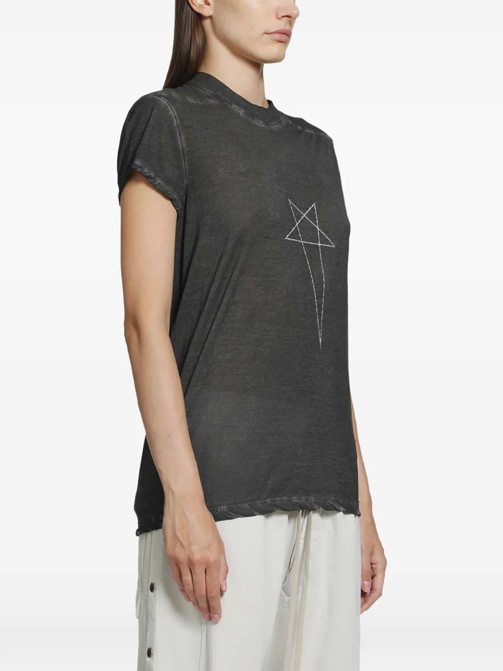 Black t-shirt worn by a person, showing the t-shirt fit