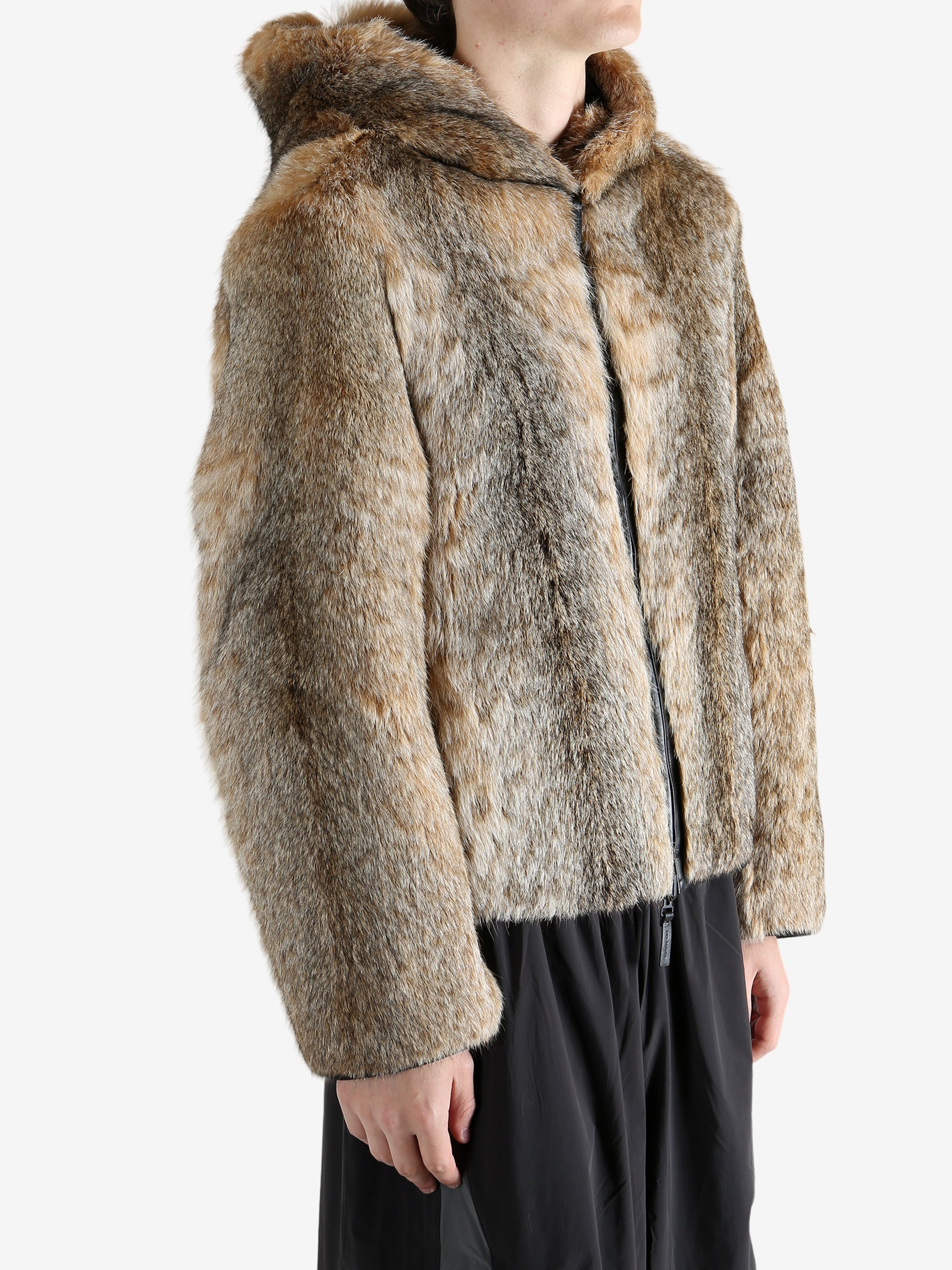 Tan jacket worn by a person, showing the jacket fit