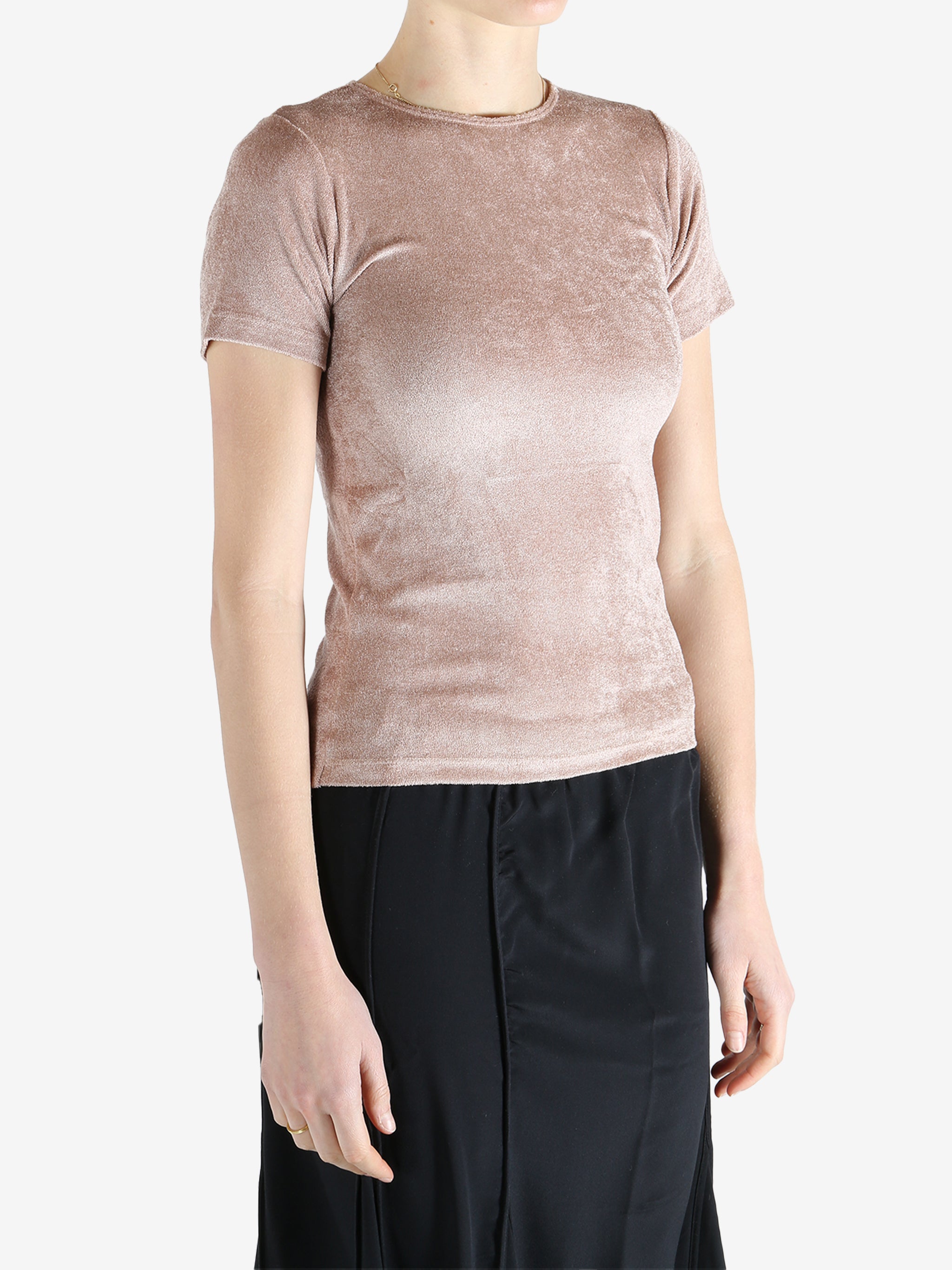 Pink t-shirt worn by a person, showing the shirt's fit