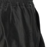 Close up of Black shorts, showing texture of the 48% alpaca/ 30% nylon/ 20% wool/ 2% spandex fabric