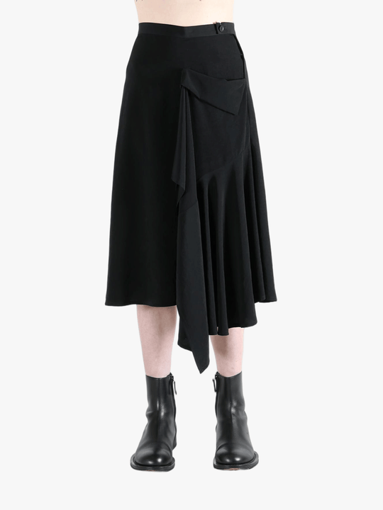 Black skirt worn by a person, showing the skirt fit