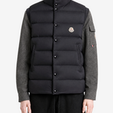 Black jacket worn by a person, showing the jacket fit