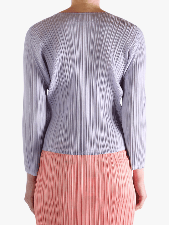 Purple shirt worn by a person, showing the shirt's fit