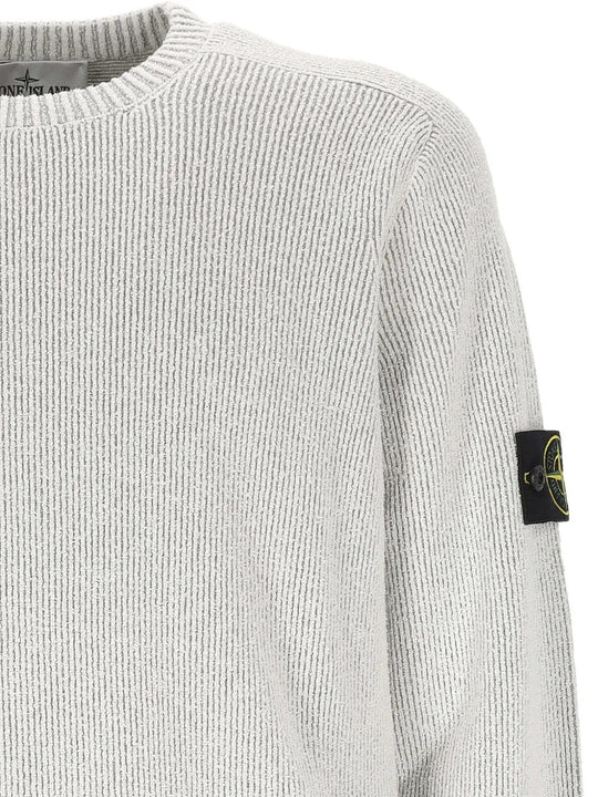 Close up of grey sweatshirt, showing texture of the cotton and polyamide and elastane fabric