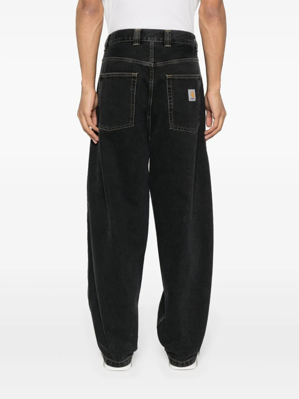 Blue pants worn by a person, showing the pants' fit