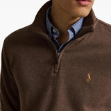 Brown knitwear worn by a person, showing the knitwear fit